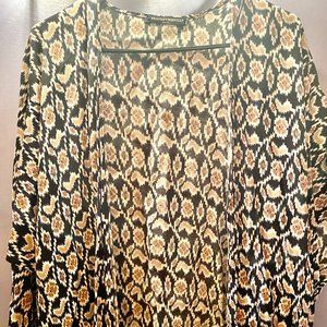 Brandy Melville, One size fits all, solid black with beige and white pattern.